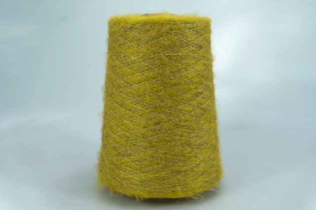 FABIFIL S.r.l. Art. JASMINE Col. 41521 ORO Состав: 16% Хлопок, 13% Меринос, 10% Модал, 30% PC, 29% PA, 2% EA. Метраж пряжи: 900м/100гр. ( 9000 )